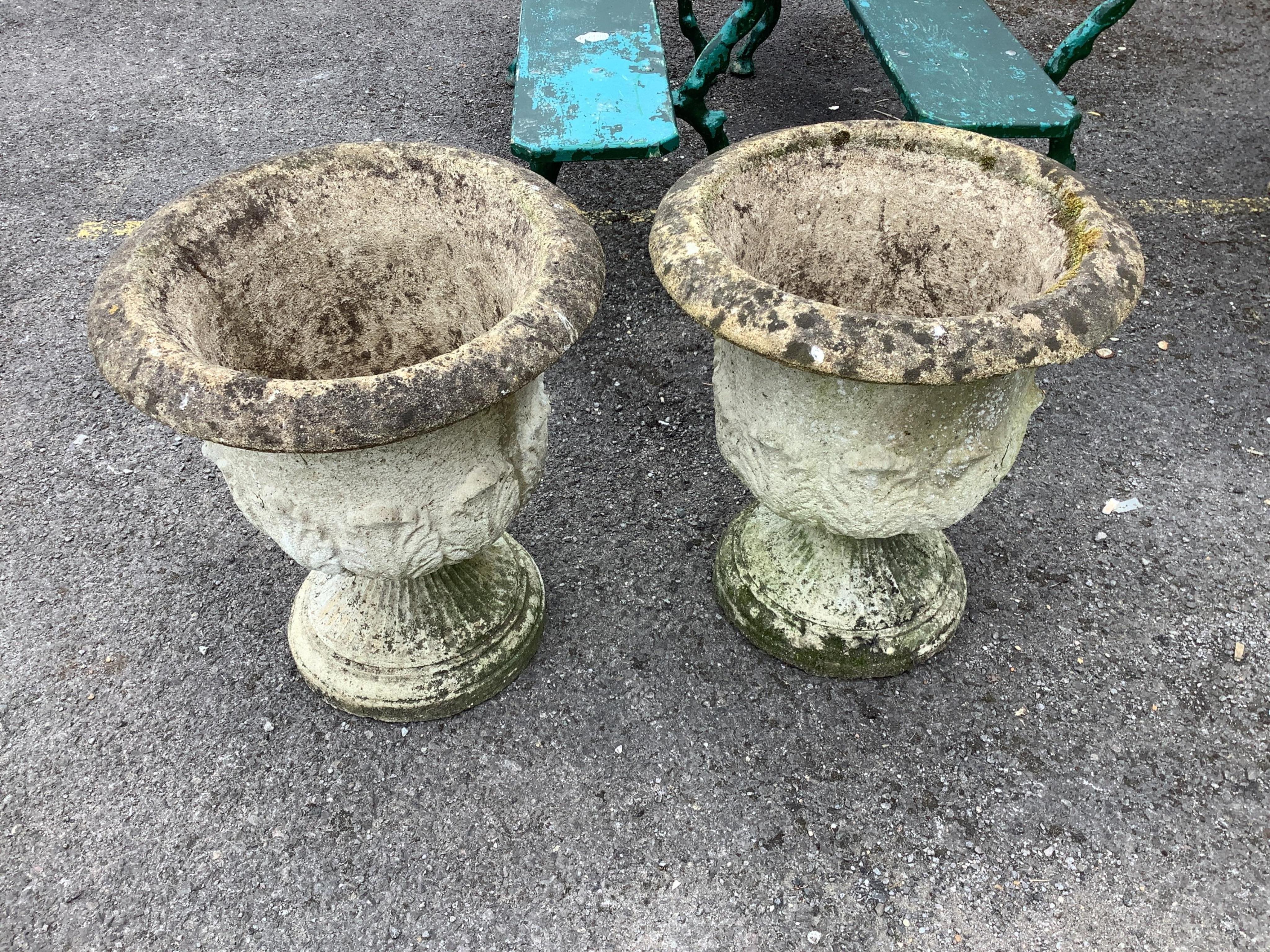 A pair of circular reconstituted stone garden planters, diameter 49cm, height 54cm. Condition - good